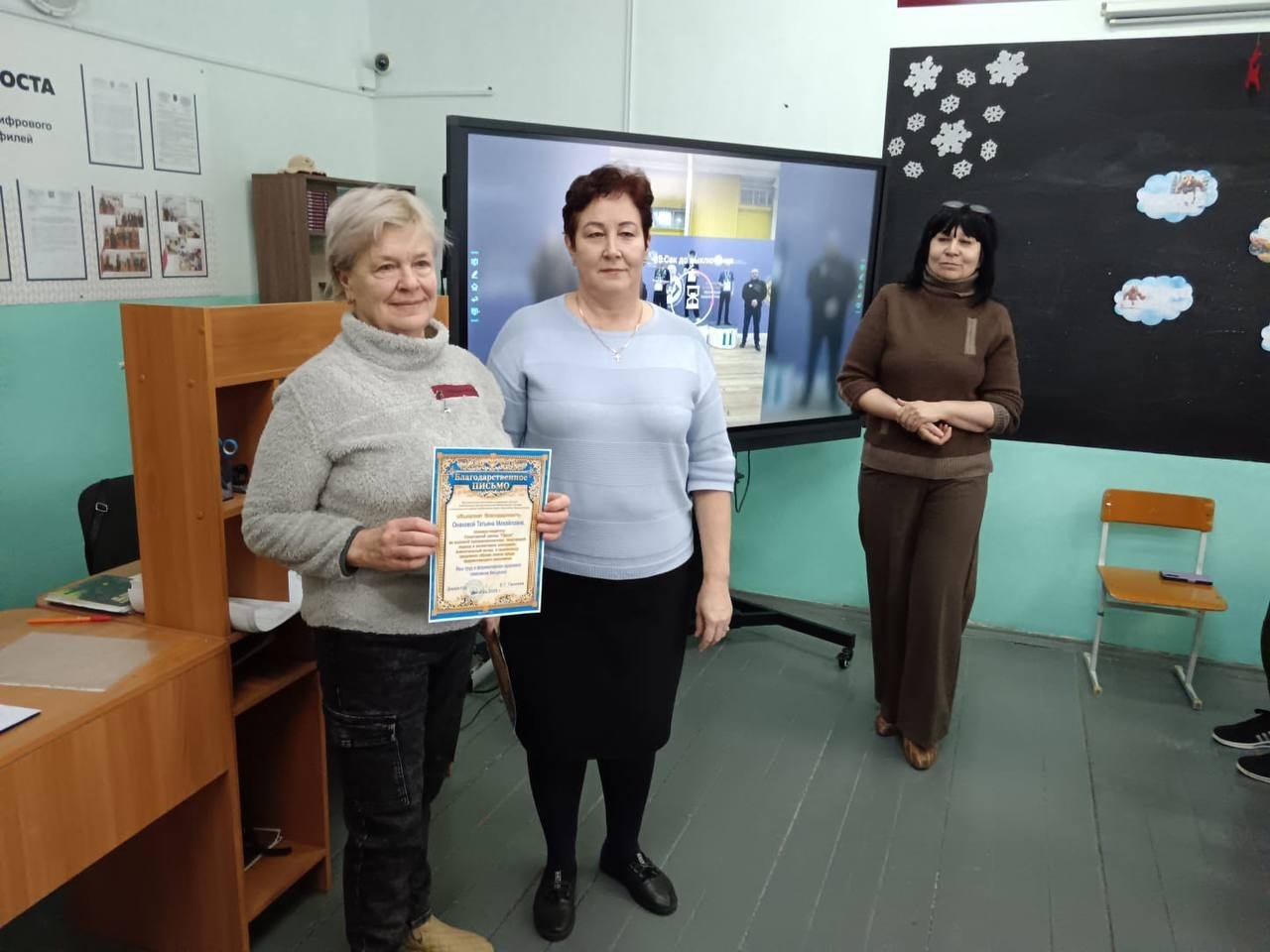 Чемпиондар мәктәп уҡыусылары янында